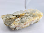 Calcit mit Pyrit 0,174 kg +/- 9x6x2 cm