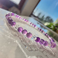 Amethyst & Kristall – handgefertigtes Reiki-Kugelarmband +/- 4 mm