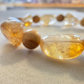 Citrin (Idar-Oberstein) & Palo Santo – handgefertigtes Reiki-Kugelarmband +/- 6-10 mm