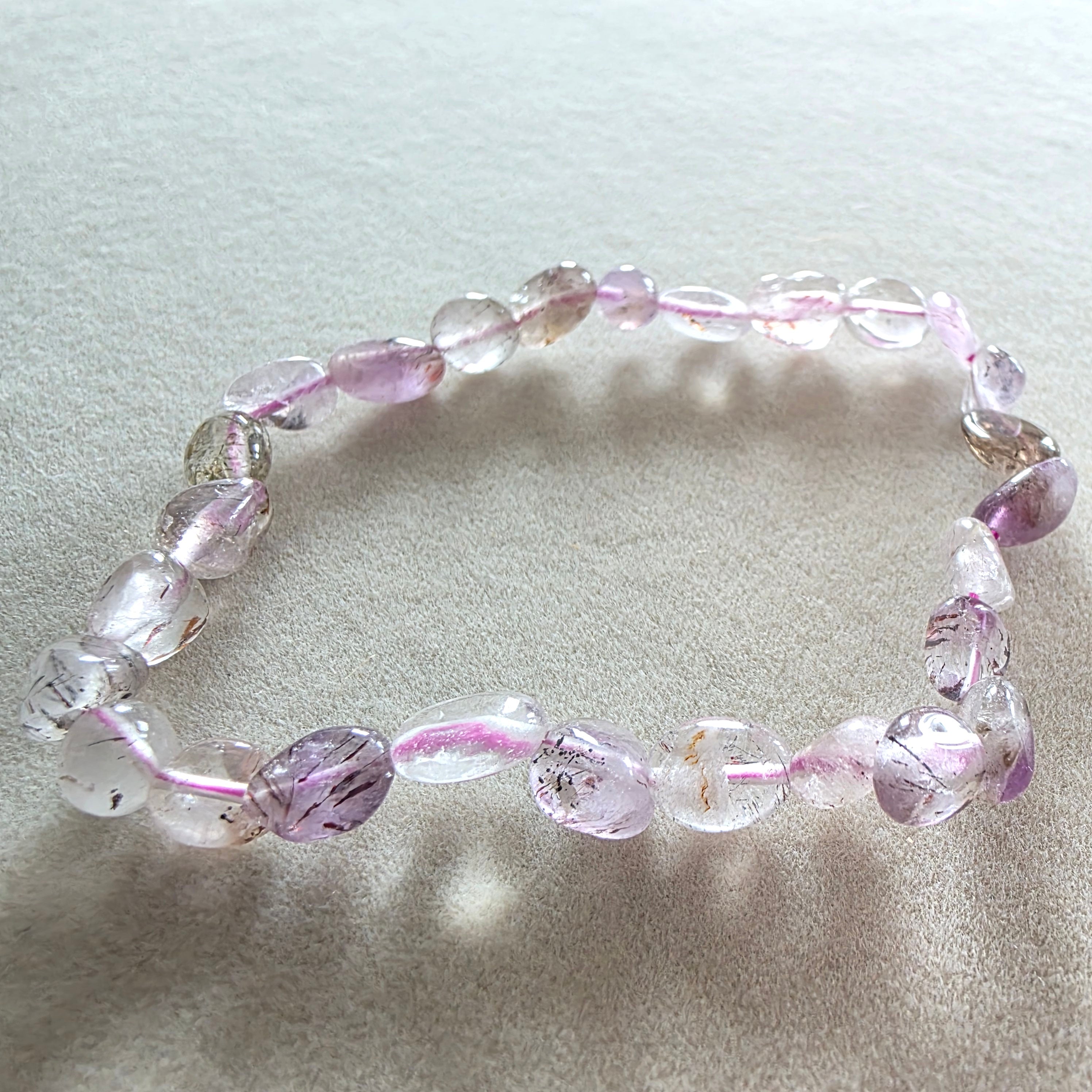 Cacoxenit Trommelsteinarmband 0,5–1 cm