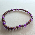 Jaspis violett mit goldener Tönung Kugelarmband 4 mm
