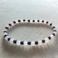 Rosenquarz mit Hämatit Kugelarmband 4 mm